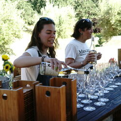 Kaitlyn pouring wine