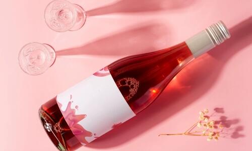 Bottle rose wine glass with long shadows 70626 12120